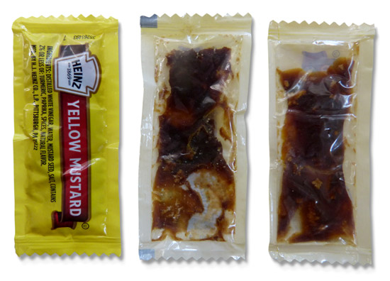 Heinz Yellow Mustard packets: 1 front; 2 clear backs showing dried contents